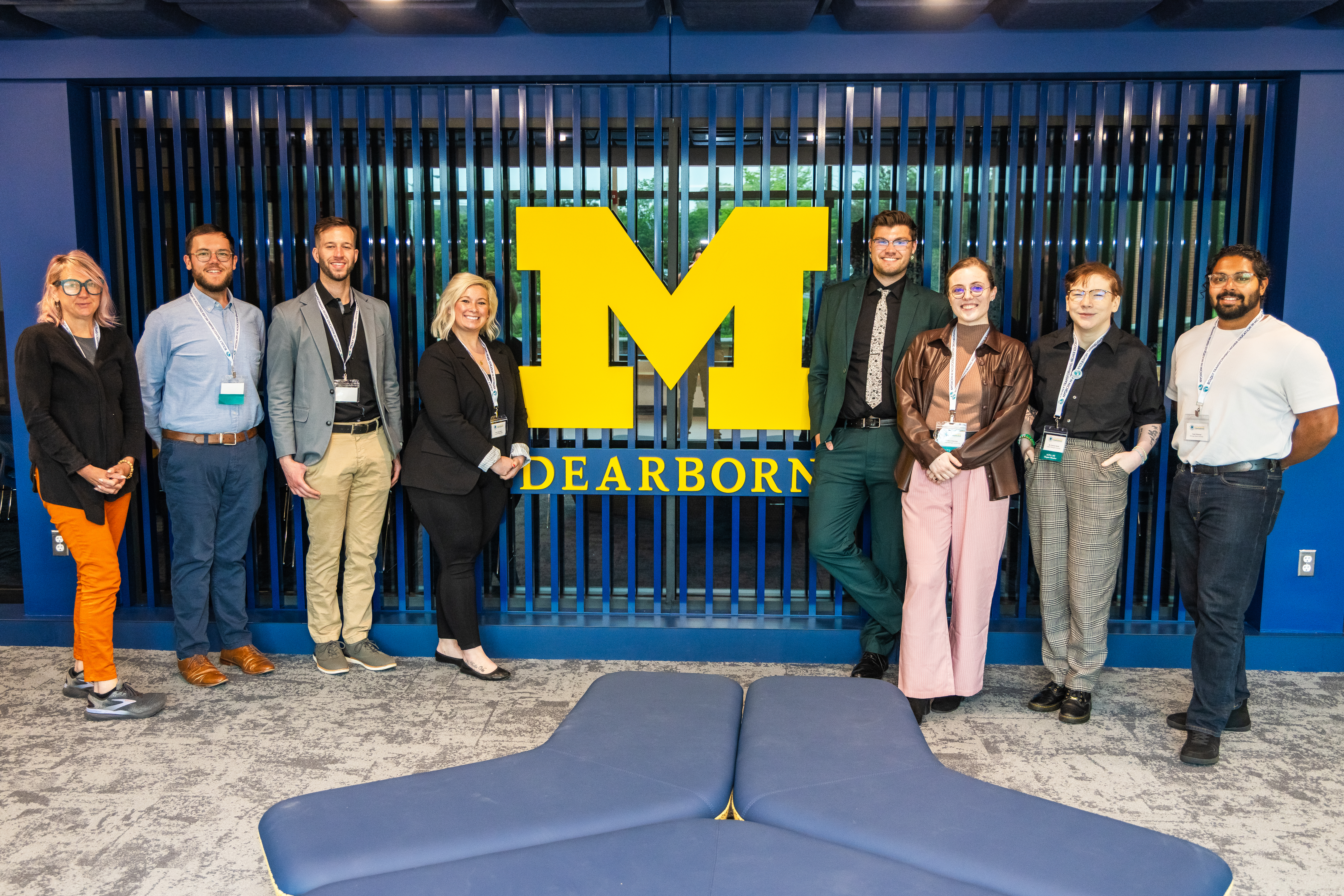ACPA-Michigan Leadership Team in front of the University of Michigan-Dearborn sign.